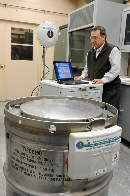 Yung Liu examines data on his laptop from the RFID system developed at the lab. The technology allows users to track nuclear materials and remotely monitor environmental and physical conditions. (Photo: Argonne National Laboratory)